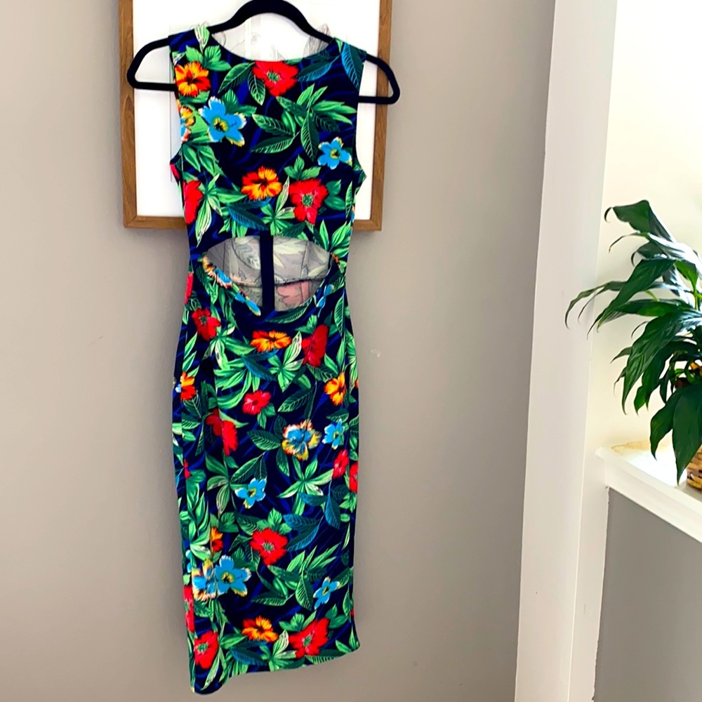 Floral cocktail dress with peekaboo midriff